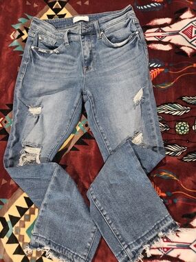 Petra 153 Women’s Light Blue Distressed Flare Jeans with Frayed Hem